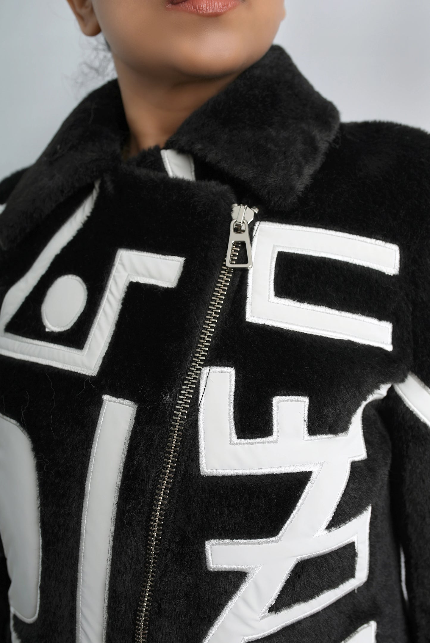 Monochrome Chic Jacket with Detachable Fox Fur Collar